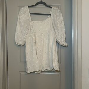 Cute Cream Romper with Daisys on it!